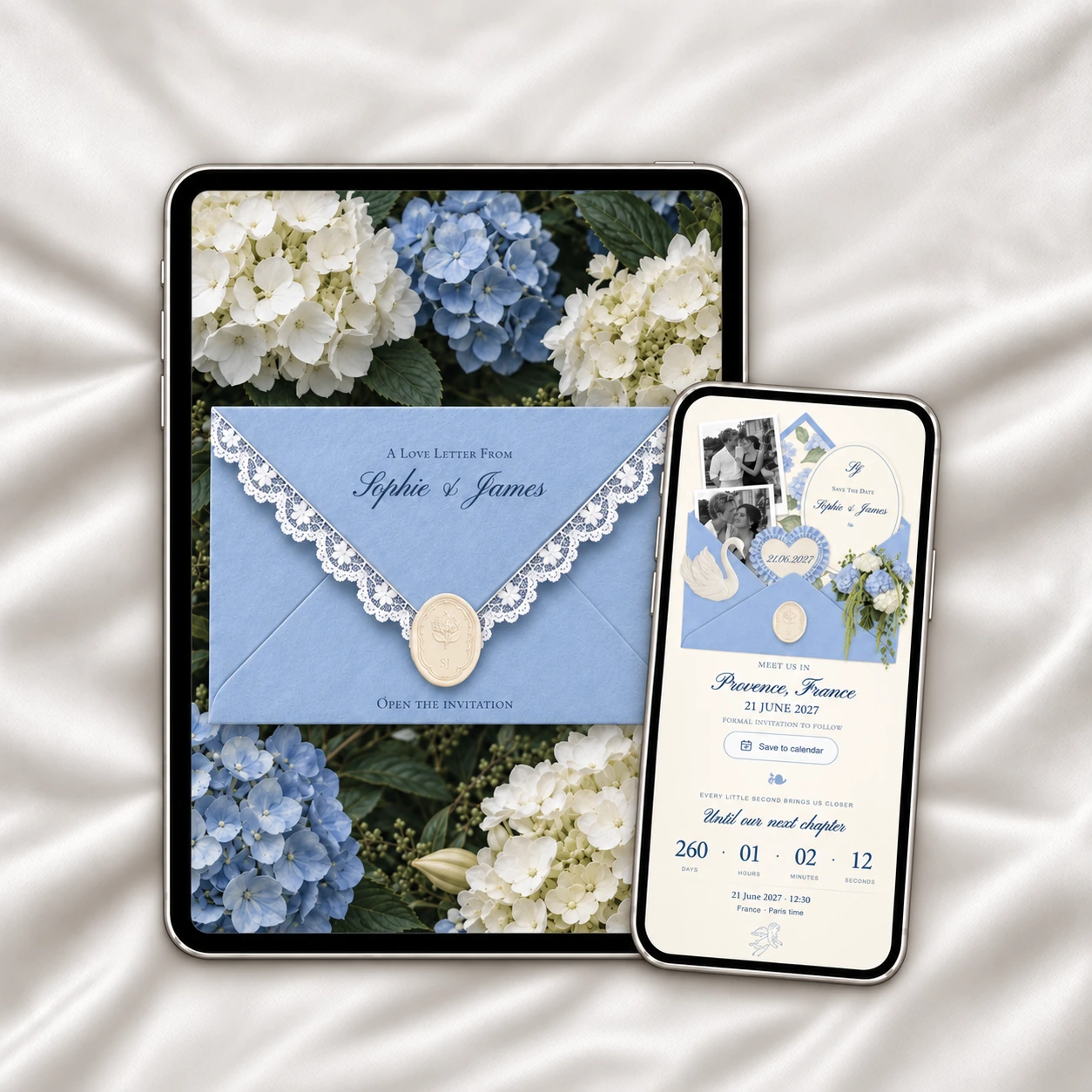 A tablet displays the blue lace envelope among hydrangeas; a phone shows the opened Save the Date, on white silk